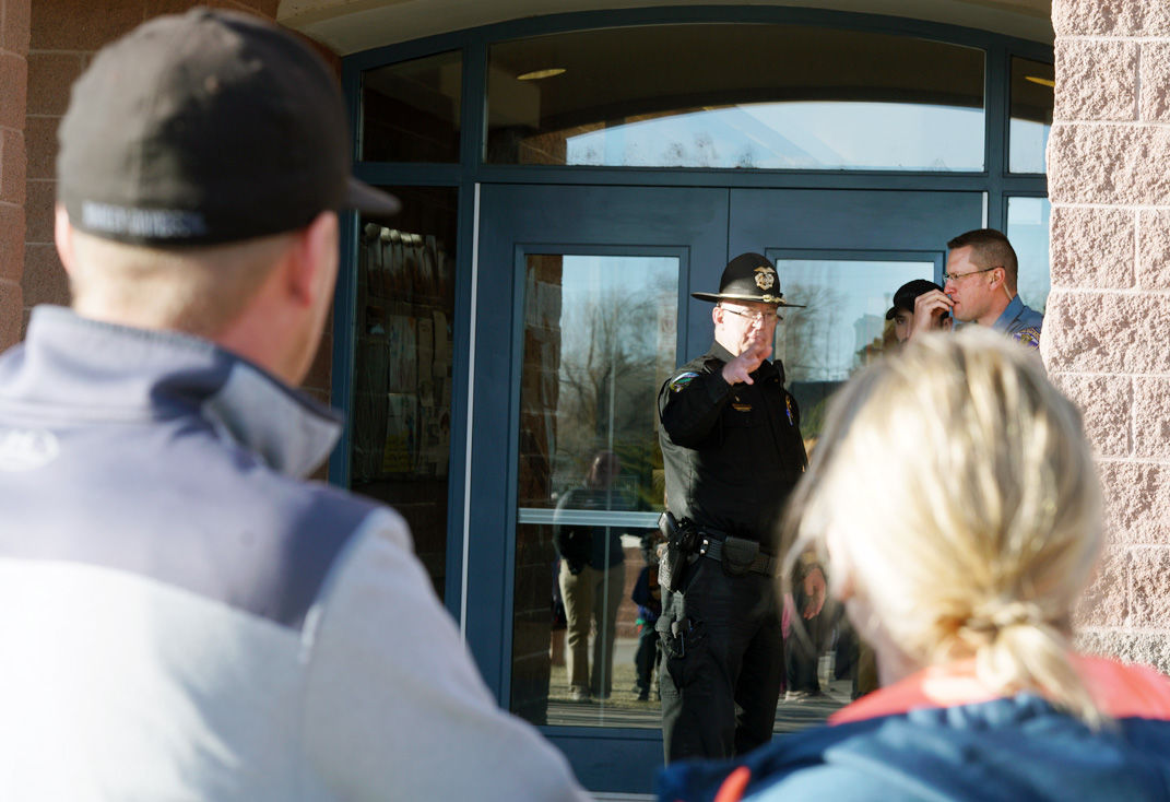 Chief Tidwell at school door